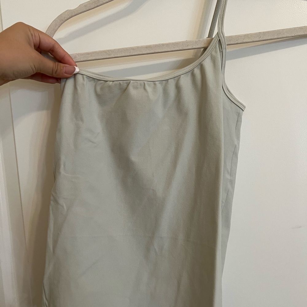 Skims one shoulder bodysuit